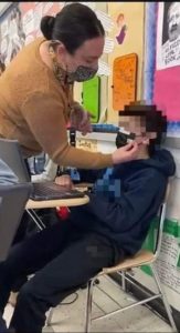 Teacher Caught Taping Mask To Student’s Face